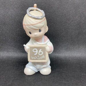 Precious Moments "Peace on Earth Anyway" 1996 annual figurine